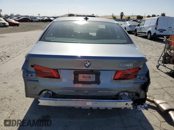 2019 BMW 5 Series 530i z VIN WBAJA5C59KBX87315, wystawiony jako Copart lot #58431155 z przebiegiem 21 667 mil mil oraz Szkoda całkowita • Salvage title. Historia ofert i sprzedaży dostępna na DreamBid. Obrazek 6.