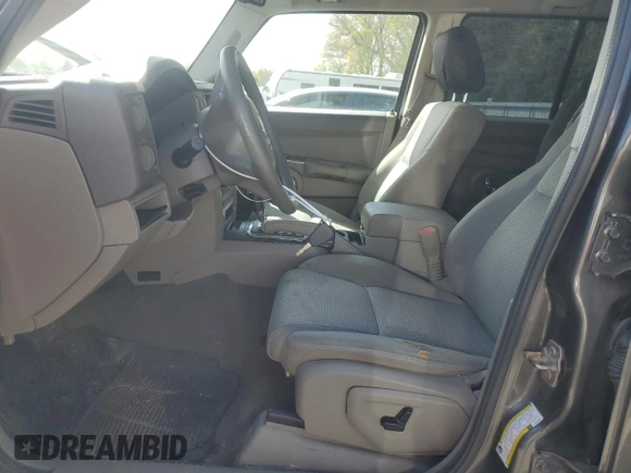 2006 Jeep Commander z VIN 1J8HG48KX6C229068, wystawiony jako Copart lot #54003995 z przebiegiem 186 875 mil mil oraz Szkoda całkowita • Salvage title. Historia ofert i sprzedaży dostępna na DreamBid. Obrazek 7.