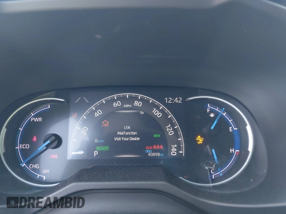 2021 Toyota RAV4 Hybrid XSE with VIN 2T3E6RFVXMW016803, listed as a IAAI auction lot 42135617 with 40,898 mi miles and . Bid and sale history available at DreamBid. Image 7.
