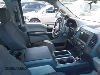 2018 Ford F-150 XL with VIN 1FTEX1EP5JKG01004, listed as a IAAI auction lot 42583232 with 123,258 mi miles and . Bid and sale history available at DreamBid. Image 5.