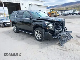 2017 Chevrolet Tahoe LT with VIN 1GNSKBKC5HR233537, listed as a IAAI auction lot 42051281 with 102,778 mi miles and . Bid and sale history available at DreamBid. Image 1.