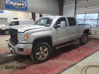 2015 GMC Sierra 2500HD SLT with VIN 1GT12ZE8XFF118001, listed as a Copart auction lot 47244475 with 119,962 mi miles and Salvage title. Bid and sale history available at DreamBid. Image 1.