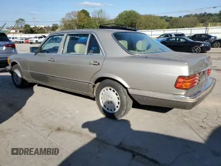 1990 Mercedes-Benz 420 with VIN WDBCA35E3LA500747, listed as a Copart auction lot 74351004 with 132,480 mi miles and Clean Title. Bid and sale history available at carsss.com. Image 2.
