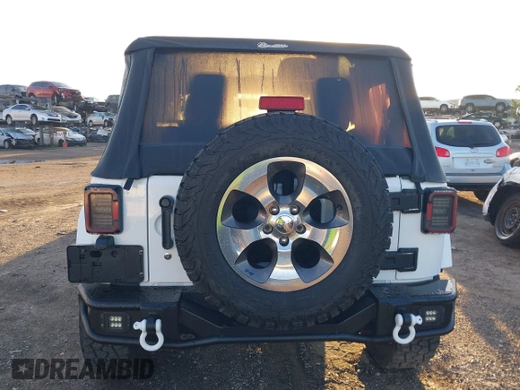 2018 Jeep Wrangler Sahara with VIN 1C4AJWBG2JL821132, listed as a IAAI auction lot 42523688 with 86,244 mi miles and . Bid and sale history available at DreamBid. Image 16.