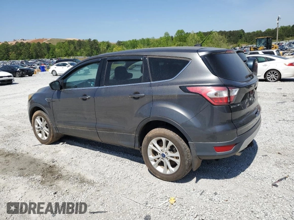 2017 Ford Escape SE z VIN 1FMCU9GD4HUE42763, wystawiony jako Copart lot #53512165 z przebiegiem 50 248 mil mil oraz Szkoda całkowita • Salvage title. Historia ofert i sprzedaży dostępna na DreamBid. Obrazek 2.