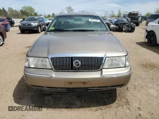 2003 Mercury Grand Marquis GS Convenience z VIN 2MEFM74WX3X619151, wystawiony jako Copart lot #55512335 z przebiegiem 101 627 mil mil oraz Szkoda całkowita • Salvage title. Historia ofert i sprzedaży dostępna na DreamBid. Obrazek 5.