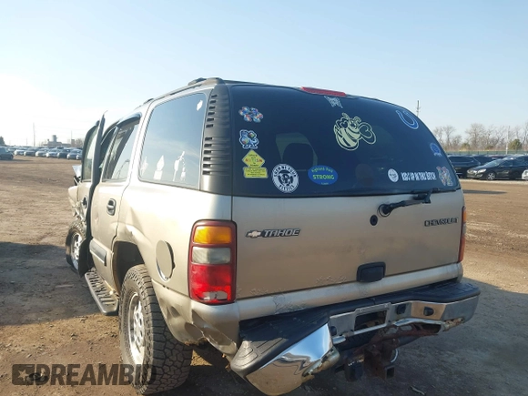 2003 Chevrolet Tahoe LS with VIN 1GNEK13V03J154985, listed as a IAAI auction lot 41708954 with 203,826 mi miles and . Bid and sale history available at DreamBid. Image 3.