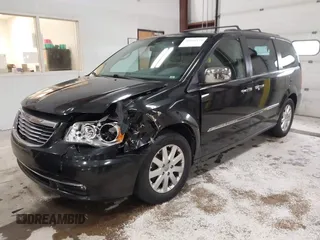 2012 Chrysler Town & Country Touring L with VIN 2C4RC1CGXCR170910, listed as a IAAI auction lot 41911179 with 167,850 mi miles and . Bid and sale history available at carsss.com. Image 17.
