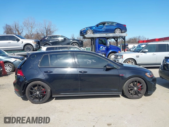 2021 Volkswagen Golf GTI S with VIN 3VW5T7AU6MM009986, listed as a IAAI auction lot 41744096 with 26,120 mi miles. Bid and sale history available at carsss.com. Image 14.