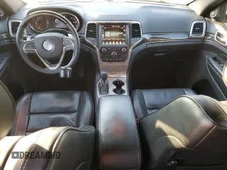 2017 Jeep Grand Cherokee Overland with VIN 1C4RJFCG3HC675125, listed as a Copart auction lot 50142865 with 113,819 mi miles and Salvage Title. Bid and sale history available at carsss.com. Image 8.