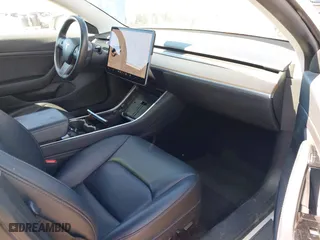 2020 Tesla Model 3 Standard Range Plus with VIN 5YJ3E1EA4LF644967, listed as a IAAI auction lot 41745984 with 23,479 mi miles. Bid and sale history available at carsss.com. Image 5.