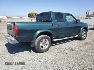 2000 Nissan Frontier XE with VIN 1N6ED27T0YC364061, listed as a Copart auction lot 61863515 with 226,867 mi miles and Clean title. Bid and sale history available at DreamBid. Image 3.