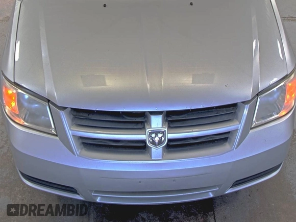 2010 Dodge Grand Caravan SE z VIN 2D4RN4DEXAR412152, wystawiony jako IAAI lot #42825395 z przebiegiem 93 398 mil mil oraz . Historia ofert i sprzedaży dostępna na DreamBid. Obrazek 3.