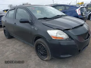 2009 Toyota Yaris with VIN JTDBT903091305715, listed as a IAAI auction lot 41896658 with 154,344 mi miles. Bid and sale history available at carsss.com. Image 1.