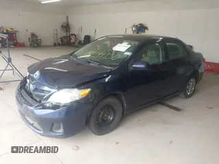2013 Toyota Corolla L with VIN 5YFBU4EE8DP217364, listed as a IAAI auction lot 42144930 with 164,721 mi miles and . Bid and sale history available at DreamBid. Image 2.