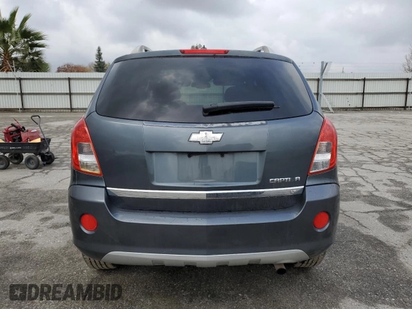 2013 Chevrolet Captiva Sport LT with VIN 3GNAL3EK1DS581084, listed as a Copart auction lot 82809984 with 153,173 mi miles and Salvage Title. Bid and sale history available at DreamBid. Image 6.