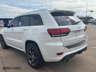 2015 Jeep Grand Cherokee SRT with VIN 1C4RJFDJ3FC896473, listed as a Copart auction lot 53915385 with 124,091 mi miles and Clean Title. Bid and sale history available at carsss.com. Image 3.
