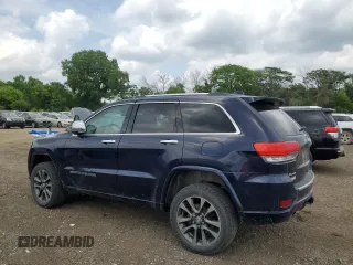 2017 Jeep Grand Cherokee Overland с VIN 1C4RJFCG4HC694654, выставлен на аукционе Copart как лот 60788645 с пробегом 155 642 миль миль и Списание • Salvage title. История ставок и продаж доступна на DreamBid. Изображение 2.