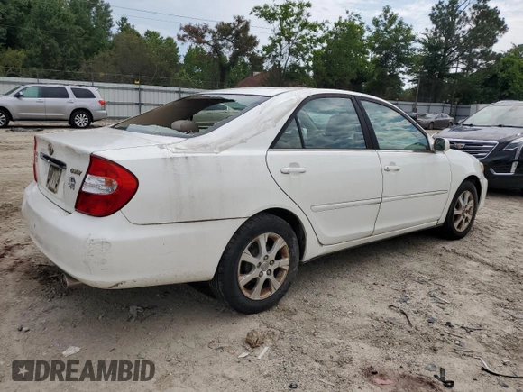 2004 Toyota Camry LE z VIN JTDBE32K440281087, wystawiony jako Copart lot #60486995 z przebiegiem 229 856 mil mil oraz Czysty tytuł • Clean title. Historia ofert i sprzedaży dostępna na DreamBid. Obrazek 3.