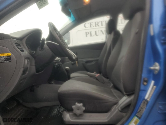 2009 Kia Rio SX with VIN KNADE223896572348, listed as a Copart auction lot 51949235 with 161,546 mi miles and Salvage Title. Bid and sale history available at carsss.com. Image 7.
