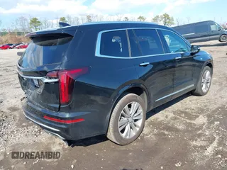 2023 Cadillac XT6 AWD Premium Luxury with VIN 1GYKPDRS8PZ153838, listed as a IAAI auction lot 41838527 with 60,034 mi miles and . Bid and sale history available at DreamBid. Image 4.