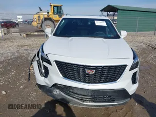 2020 Cadillac XT4 AWD Premium Luxury z VIN 1GYFZDR45LF016381, wystawiony jako IAAI lot #41556874 z przebiegiem 23 887 mil mil oraz . Historia ofert i sprzedaży dostępna na DreamBid. Obrazek 12.
