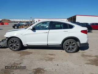 2016 BMW X4 xDrive28i z VIN 5UXXW3C59G0R19977, wystawiony jako IAAI lot #41840665 z przebiegiem 69 353 mil mil oraz . Historia ofert i sprzedaży dostępna na DreamBid. Obrazek 15.