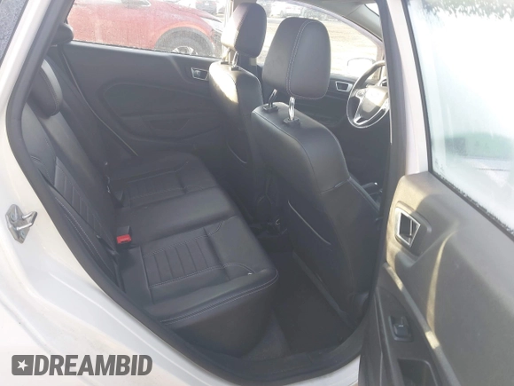 2017 Ford Fiesta Titanium with VIN 3FADP4FJ8HM112435, listed as a IAAI auction lot 41005143 with 75,144 mi miles and . Bid and sale history available at DreamBid. Image 8.