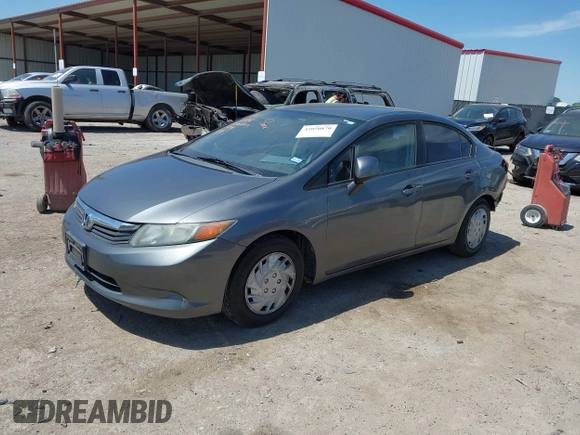 2012 Honda Civic LX z VIN 19XFB2F57CE012290, wystawiony jako IAAI lot #42030870 z przebiegiem 191 886 mil mil oraz . Historia ofert i sprzedaży dostępna na DreamBid. Obrazek 17.