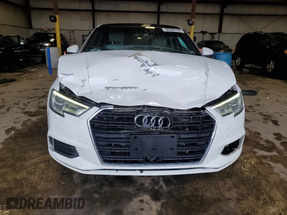 2017 Audi A3 Premium z VIN WAUAUGFFXH1056382, wystawiony jako Copart lot #56946195 z przebiegiem 162 612 mil mil oraz Szkoda całkowita • Salvage title. Historia ofert i sprzedaży dostępna na DreamBid. Obrazek 5.