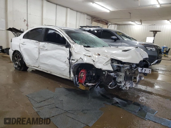 2015 Mitsubishi Lancer Evolution Final Edition z VIN JA32W7FV4FU028743, wystawiony jako Copart lot #75206334 z przebiegiem 51 409 mil mil oraz Szkody całkowita. Historia ofert i sprzedaży dostępna na DreamBid. Obrazek 4.