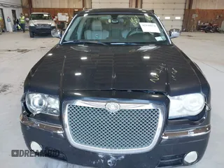 2006 Chrysler 300 C with VIN 2C3KA63H06H421414, listed as a IAAI auction lot 42144274 with 118,692 mi miles. Bid and sale history available at carsss.com. Image 6.