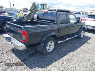 2000 Nissan Frontier XE with VIN 1N6ED27T3YC422325, listed as a IAAI auction lot 42268431 with 169,994 mi miles and . Bid and sale history available at DreamBid. Image 4.