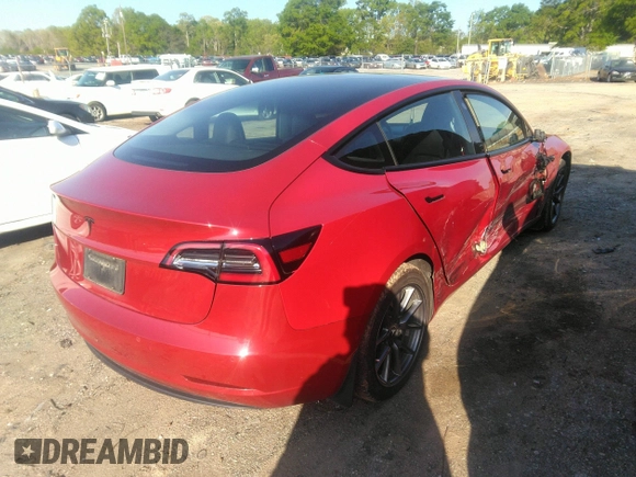 2022 Tesla Model 3 Long Range with VIN 5YJ3E1EB4NF171972, listed as a IAAI auction lot 42026031 with 40,489 mi miles and . Bid and sale history available at DreamBid. Image 4.