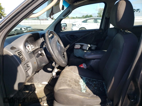 2004 Ford Escape XLS with VIN 1FMYU92134KA21707, listed as a Copart auction lot 72114804 with 219,518 mi miles and Salvage Title. Bid and sale history available at DreamBid. Image 7.