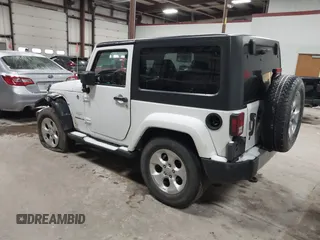 2014 Jeep Wrangler Sahara with VIN 1C4AJWBG7EL234625, listed as a IAAI auction lot 41726770 with 128,080 mi miles and . Bid and sale history available at DreamBid. Image 3.
