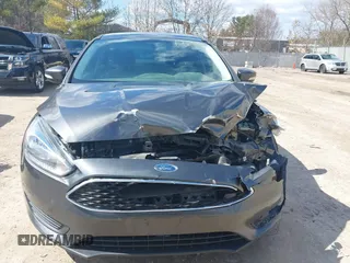 2018 Ford Focus SE with VIN 1FADP3F26JL249433, listed as a IAAI auction lot 41871395 with 131,357 mi miles. Bid and sale history available at carsss.com. Image 12.