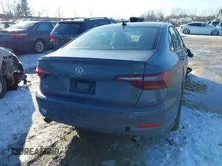 2019 Volkswagen Jetta GLI S z VIN 3VW6T7BU6KM209458, wystawiony jako IAAI lot #41334724 z przebiegiem 53 634 mil mil oraz . Historia ofert i sprzedaży dostępna na DreamBid. Obrazek 4.