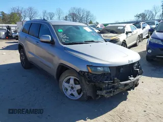 2017 Jeep Grand Cherokee Altitude z VIN 1C4RJFAG2HC706870, wystawiony jako IAAI lot #41469072 z przebiegiem 91 289 mil mil oraz . Historia ofert i sprzedaży dostępna na DreamBid. Obrazek 1.