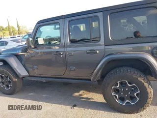2023 Jeep Wrangler Rubicon with VIN 1C4JJXR67PW662277, listed as a IAAI auction lot 41950065 with 35,714 mi miles and . Bid and sale history available at DreamBid. Image 14.