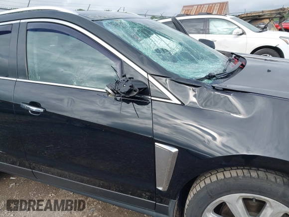 2015 Cadillac SRX Performance Collection with VIN 3GYFNFE35FS591343, listed as a IAAI auction lot 42644949 with 118,718 mi miles and . Bid and sale history available at DreamBid. Image 12.