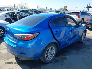 2016 Scion iA with VIN 3MYDLBZV5GY107520, listed as a IAAI auction lot 41647663 with 183,309 mi miles. Bid and sale history available at carsss.com. Image 4.
