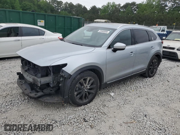 2016 Mazda CX-9 Signature with VIN JM3TCBEY9G0104888, listed as a Copart auction lot 53465095 with 138,819 mi miles and Salvage Title. Bid and sale history available at DreamBid. Image 1.