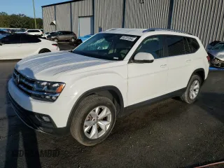 2019 Volkswagen Atlas SE with VIN 1V2DP2CA9KC595931, listed as a Copart auction lot 84701994 with 77,000 mi miles and Salvage title. Bid and sale history available at DreamBid. Image 1.