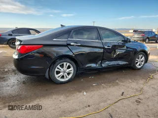 2013 Hyundai Sonata SE z VIN 5NPEC4AC5DH660721, wystawiony jako Copart lot #41617025 z przebiegiem 193 006 mil mil oraz Szkoda całkowita • Salvage title. Historia ofert i sprzedaży dostępna na DreamBid. Obrazek 3.