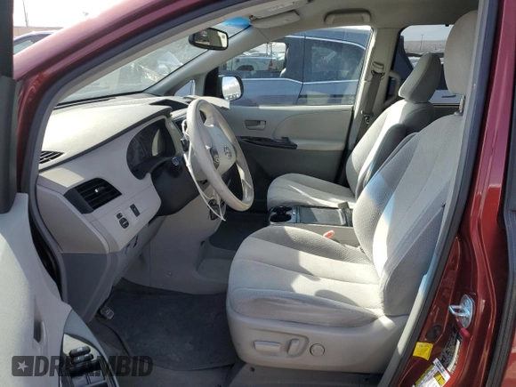 2012 Toyota Sienna LE AAS with VIN 5TDKK3DC5CS251140, listed as a Copart auction lot 50882805 with 219,401 mi miles and Salvage Title. Bid and sale history available at carsss.com. Image 7.