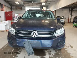 2016 Volkswagen Tiguan S with VIN WVGBV7AXXGW565289, listed as a IAAI auction lot 42113317 with 83,537 mi miles and . Bid and sale history available at DreamBid. Image 12.
