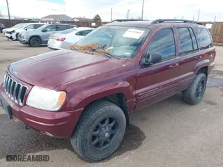 2002 Jeep Grand Cherokee Limited with VIN 1J8GW58N02C324540, listed as a IAAI auction lot 41476068 with 205,646 mi miles. Bid and sale history available at carsss.com. Image 2.