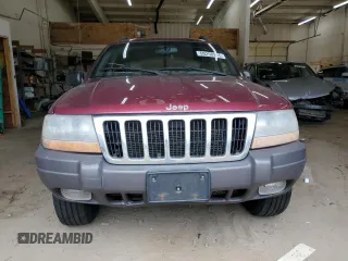2001 Jeep Grand Cherokee Laredo z VIN 1J4GW48S11C609344, wystawiony jako Copart lot #59258245 z przebiegiem 162 141 mil mil oraz Szkoda całkowita • Salvage title. Historia ofert i sprzedaży dostępna na DreamBid. Obrazek 5.