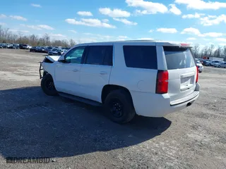 2020 Chevrolet Tahoe Commercial with VIN 1GNSKDEC2LR217697, listed as a IAAI auction lot 40815499 with 128,503 mi miles. Bid and sale history available at carsss.com. Image 3.